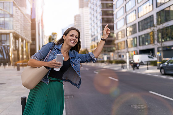 girl hailing a ride